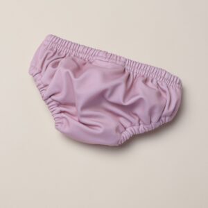 An image of a purple Lumi Brief Swim Nappy on a white background.
