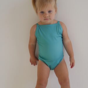 A little girl wearing the Sorbet Summer - Mara One-Piece swimsuit.
