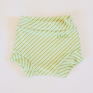 A green and white striped Retro Wave By Ina - Lumi Short Swim Nappy on a white surface.