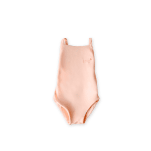 A Mara One-Piece - Peach Blossom laid out flat on a white background.
